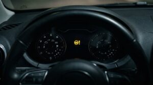what does a yellow steering wheel light mean